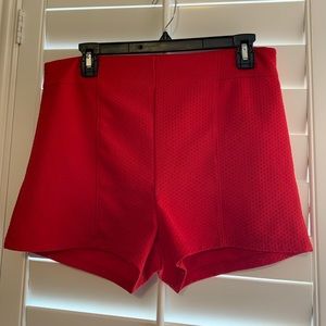 High waisted red shorts with zipper on back